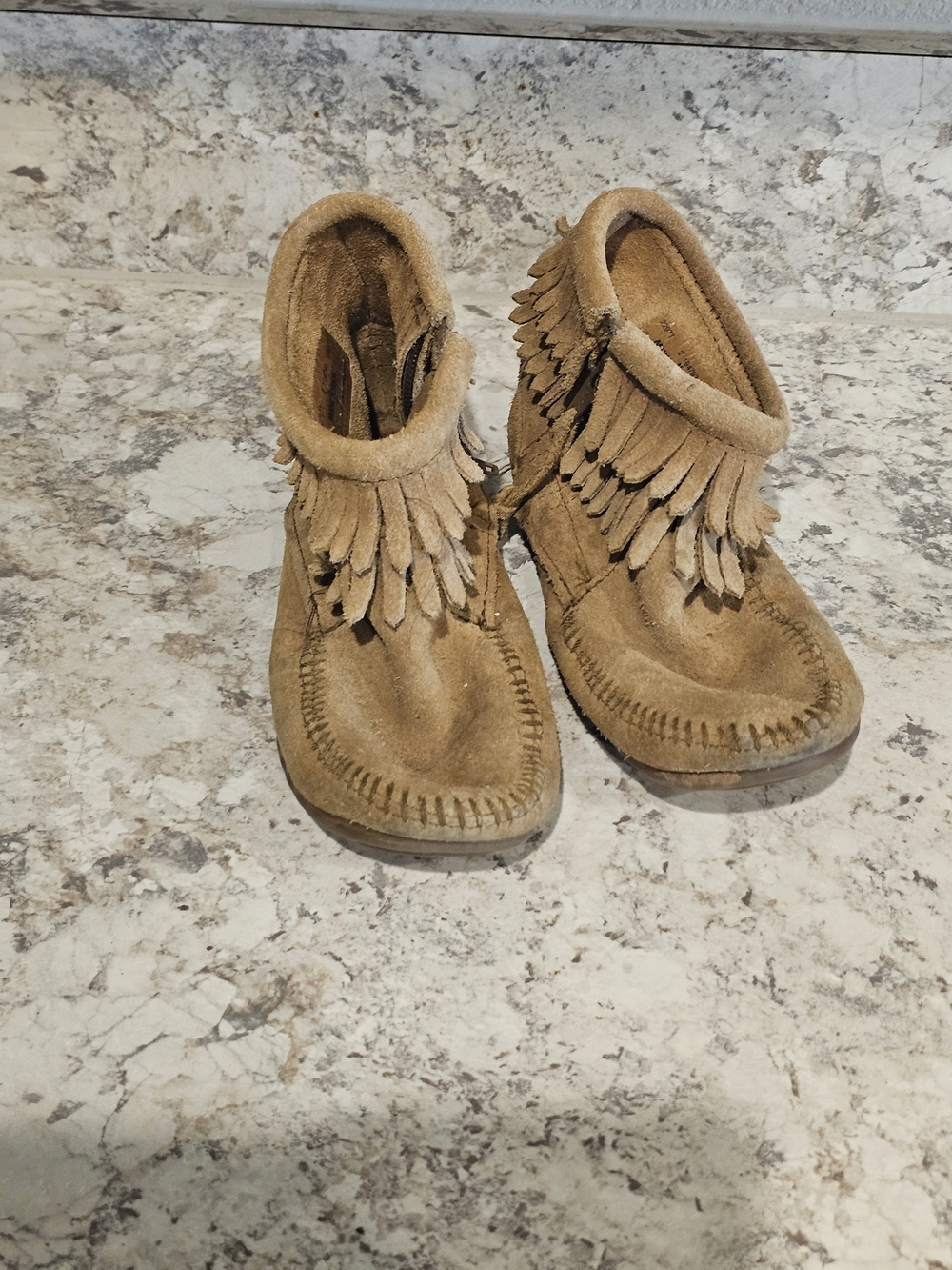 Minnetonka Kids Fringe Moccasin Boots in Tan Suede
